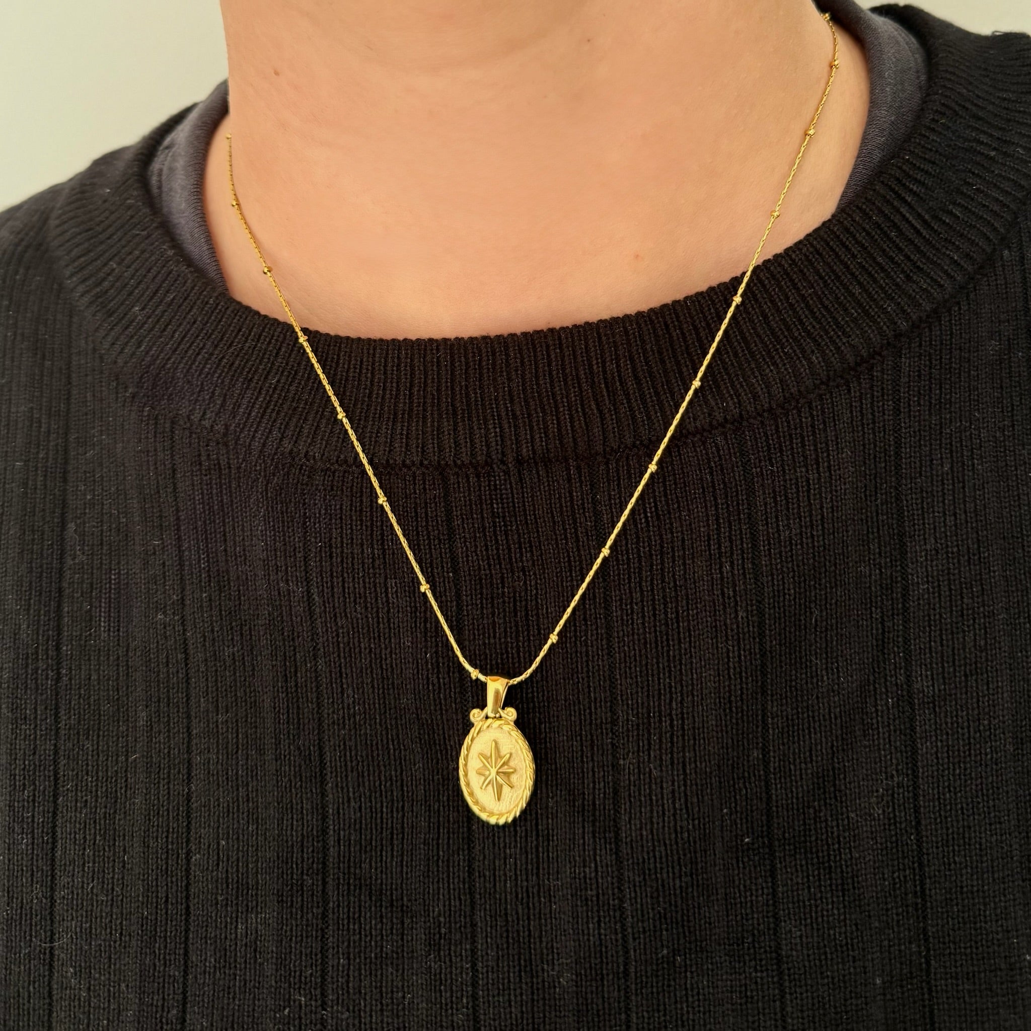 GOLD OVAL STARBURST PENDANT NECKLACE SAMPLE