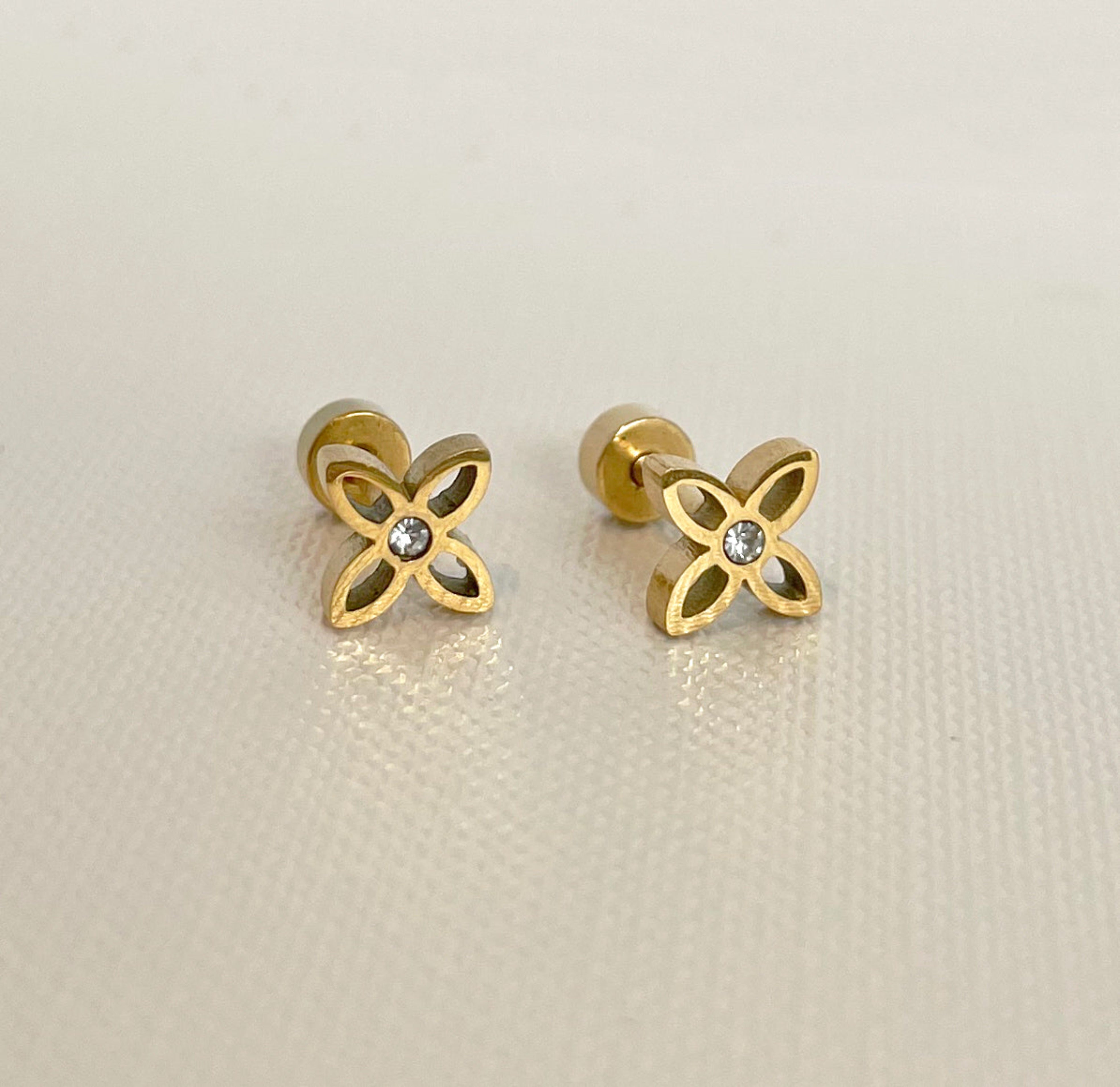 dainty gold flower earrings screw back waterproof jewelry
