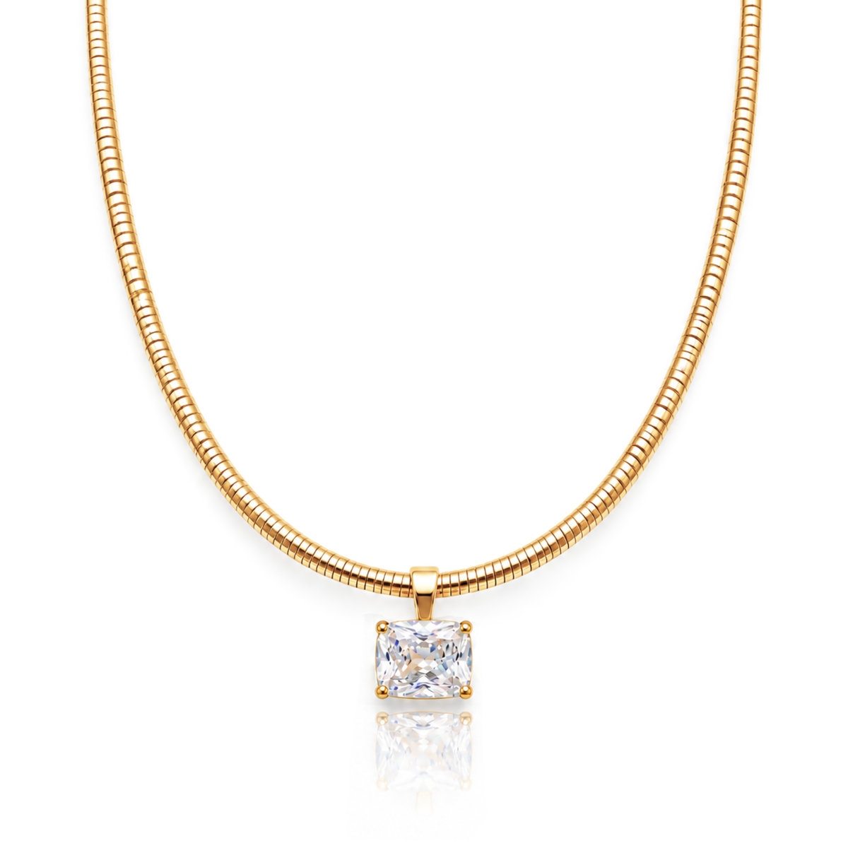 A gold snake chain necklace with a single princess-cut clear gemstone pendant, displayed on a clean white background with a soft reflection below.