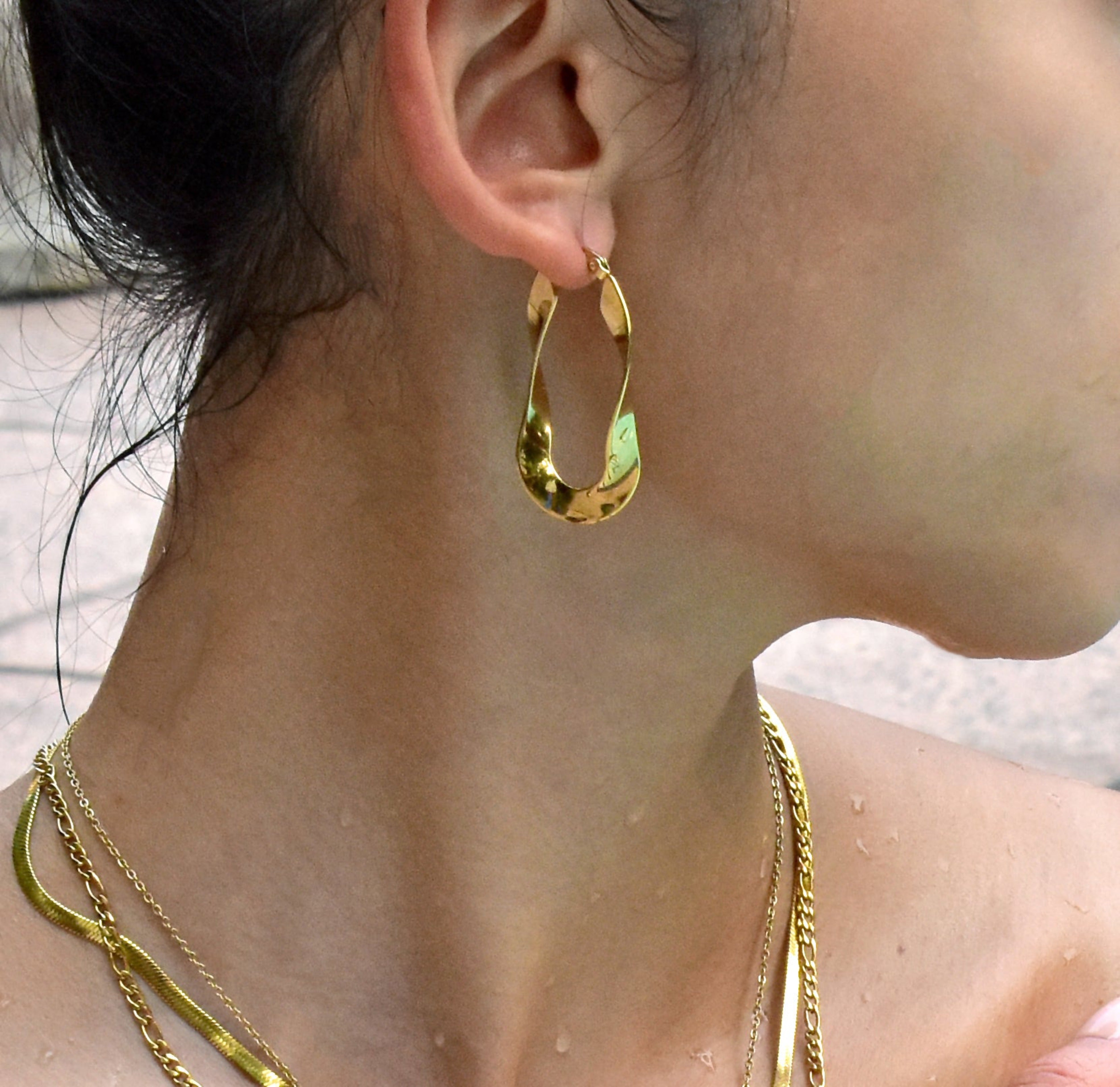 gold twist hoop woman's waterproof jewelry