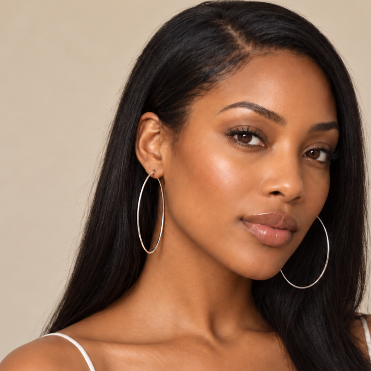thin silver large hoops waterproof jewelry on model