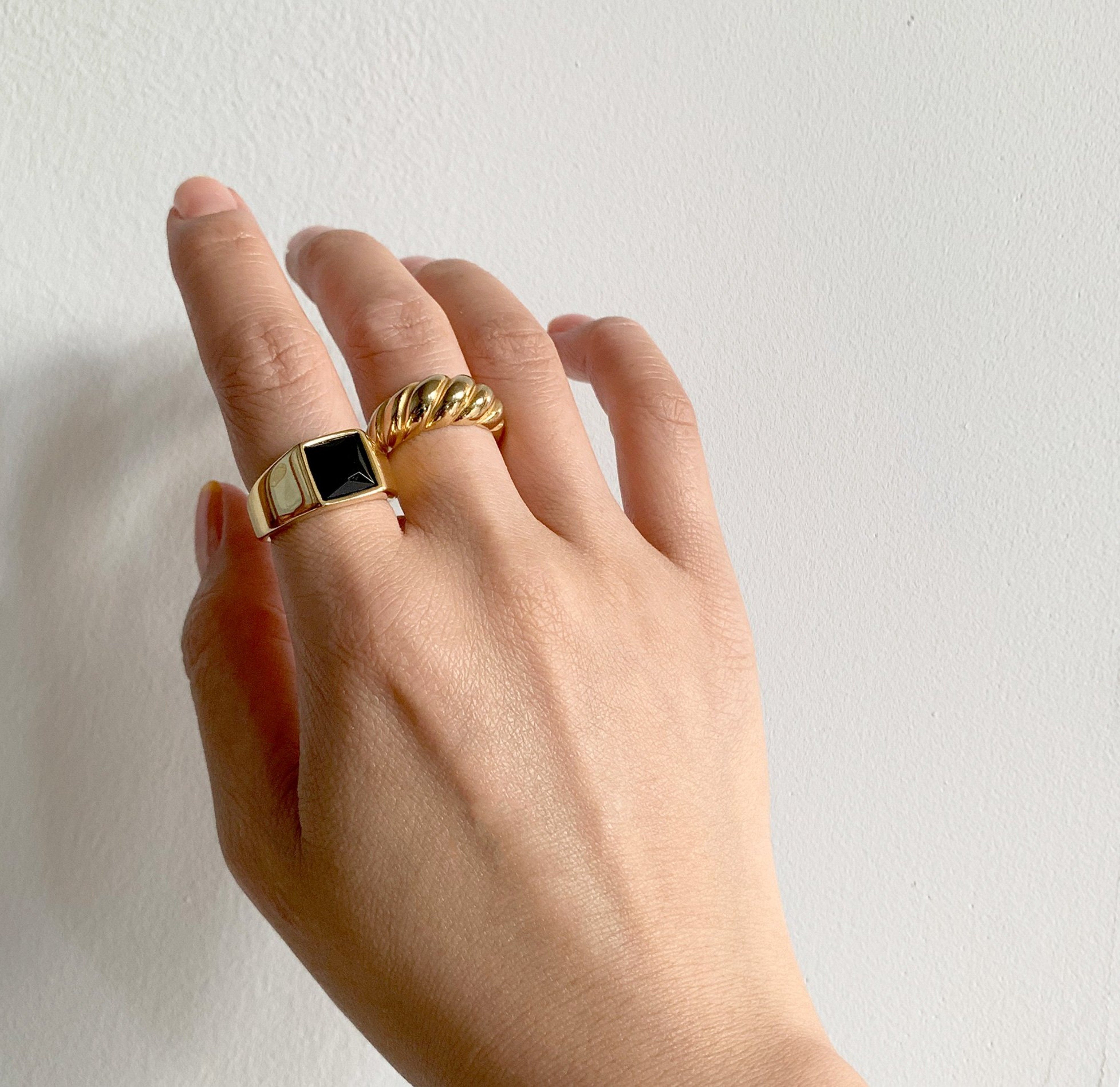 gold onyx signet ring paired with gold Margaux ring waterproof jewelry