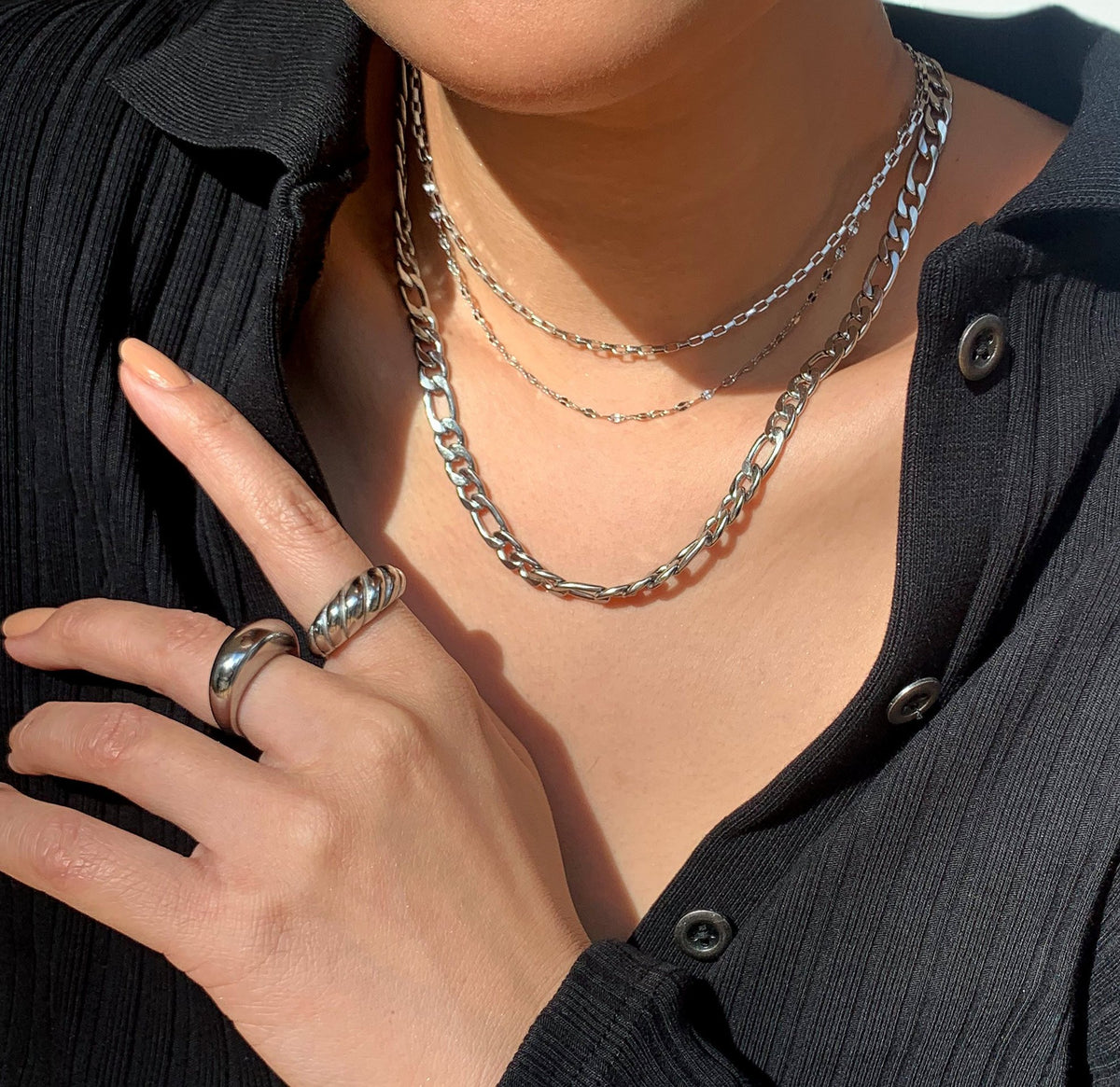 Silver classic croissant ring paired with capri silver dome ring. Waterproof rings