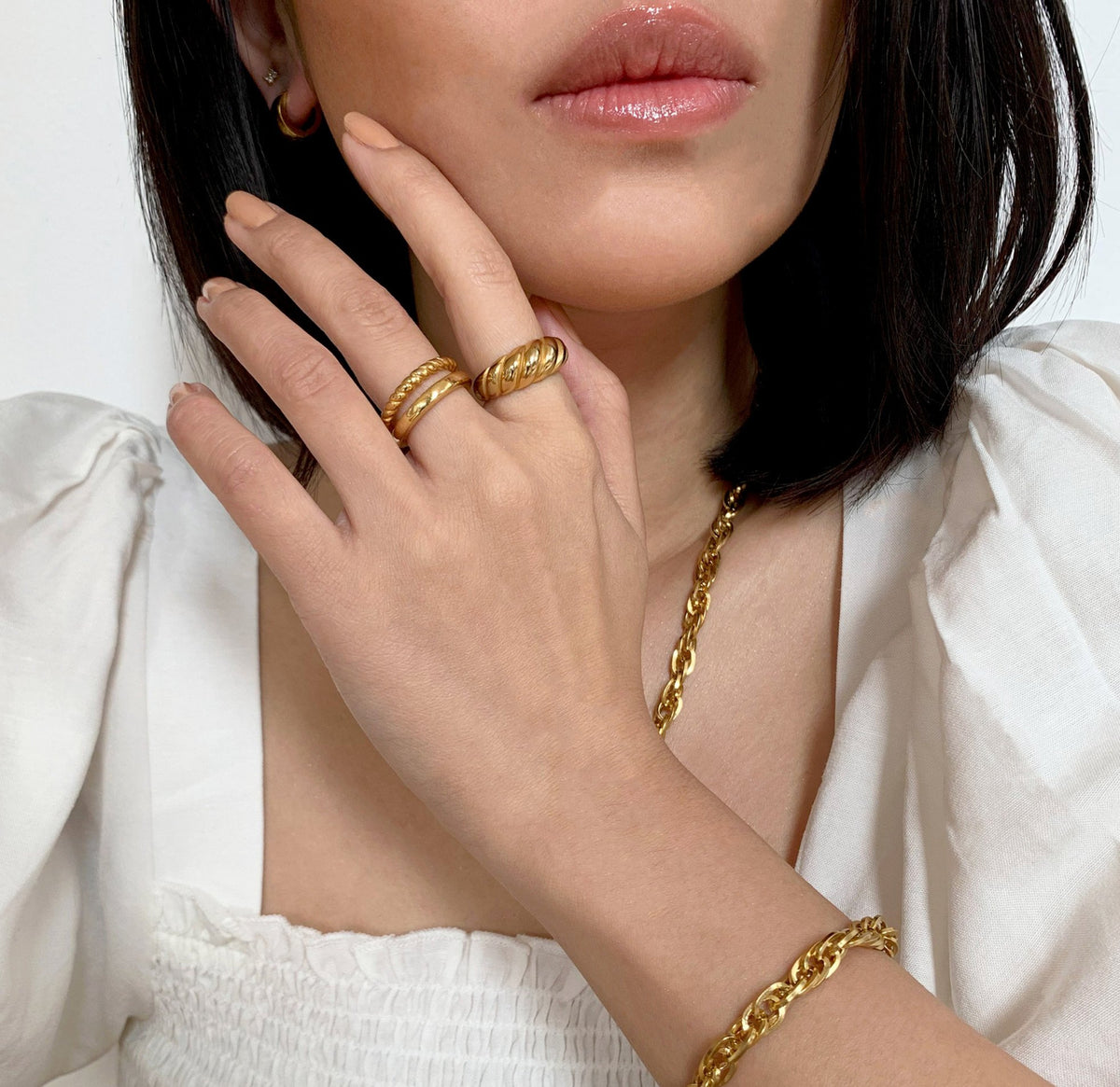 Gold classic croissant ring paired with Birdy duo ring. Waterproof rings