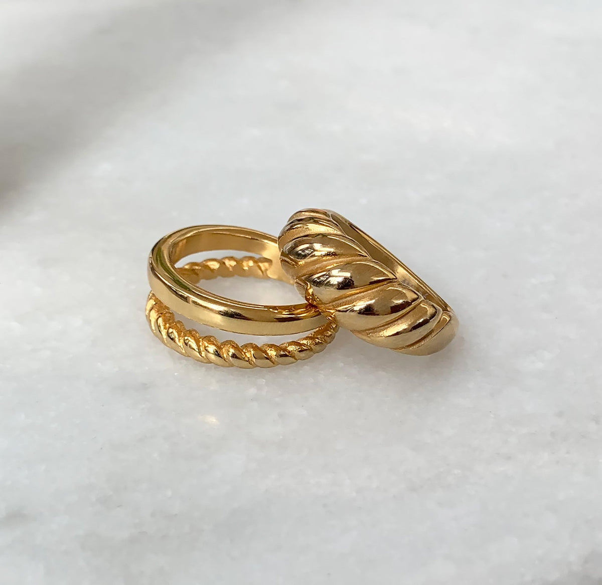 Gold classic croissant ring paired with Birdy gold duo ring. Waterproof rings