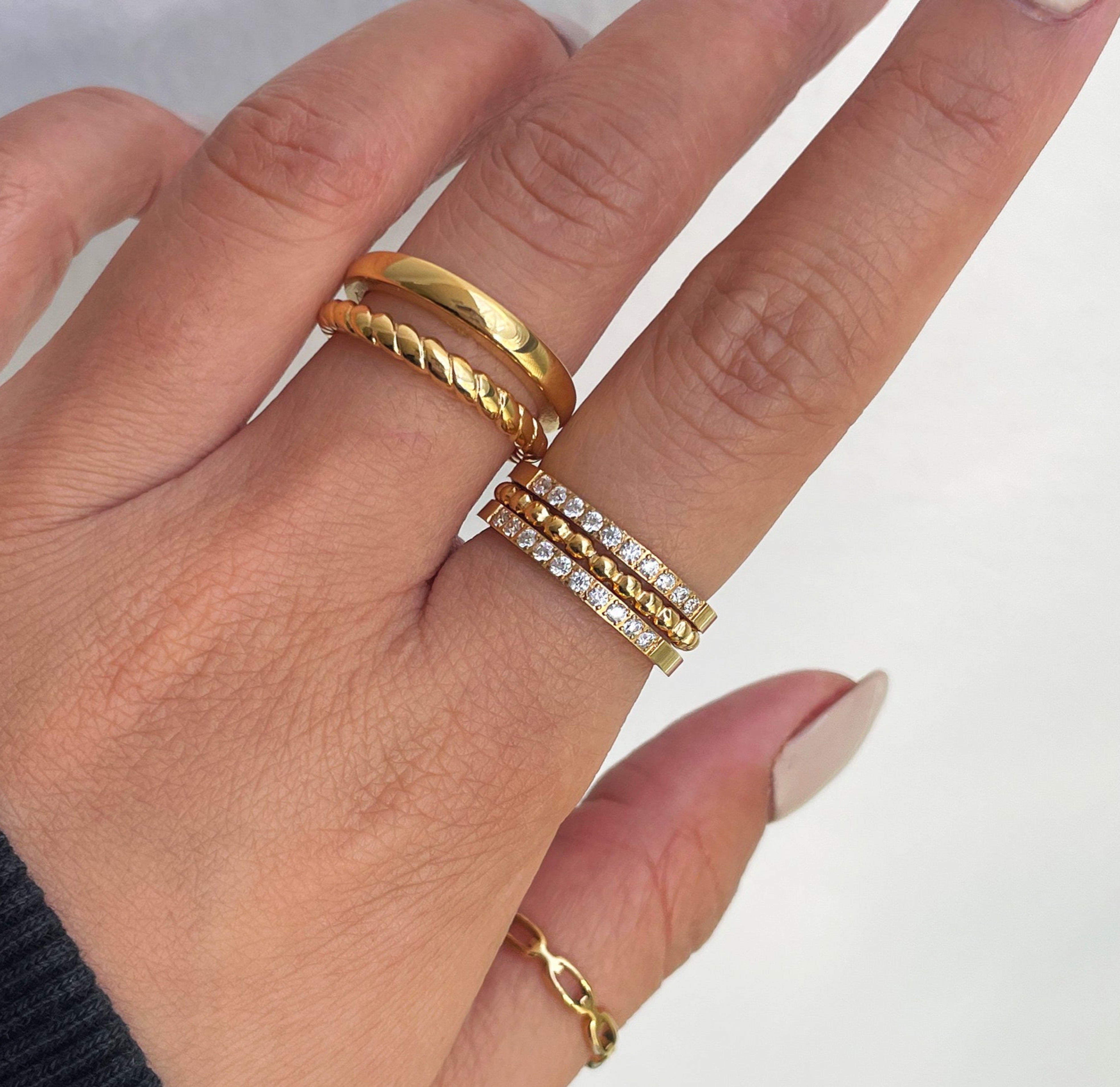 Stella gold half eternity ring band paired with Birdy gold duo ring band, gold waterproof jewelry