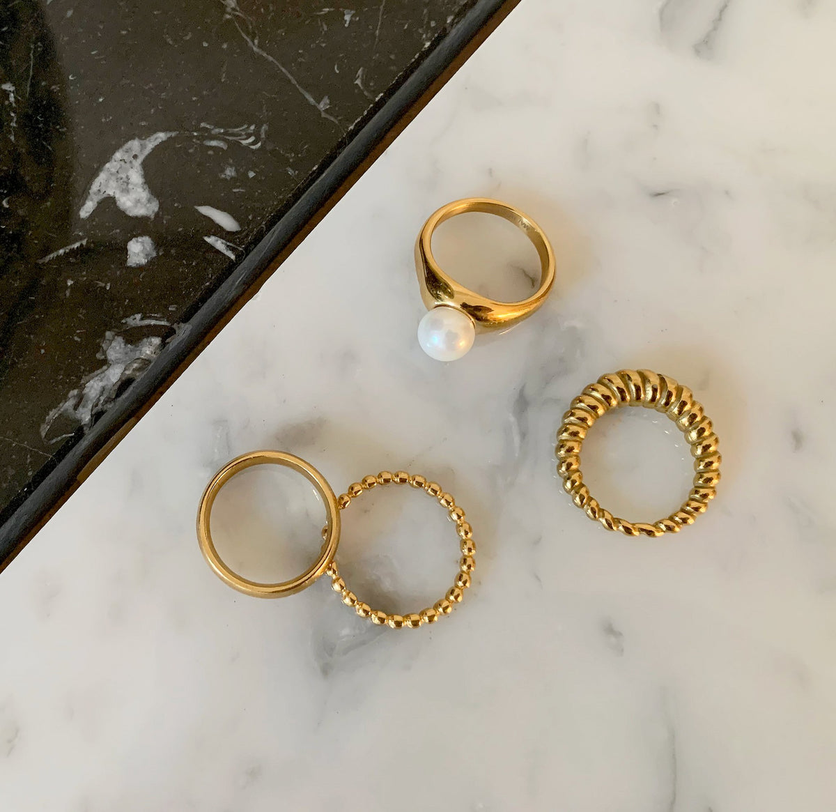 various styles of waterproof gold rings