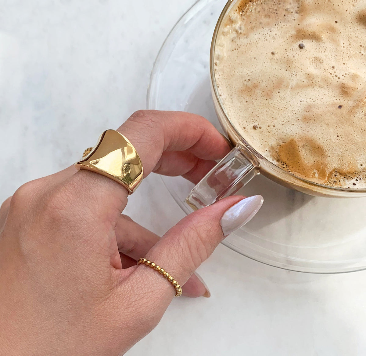 Jordyn gold saddle ring paired with Jaina gold beaded ring band, waterproof jewelry