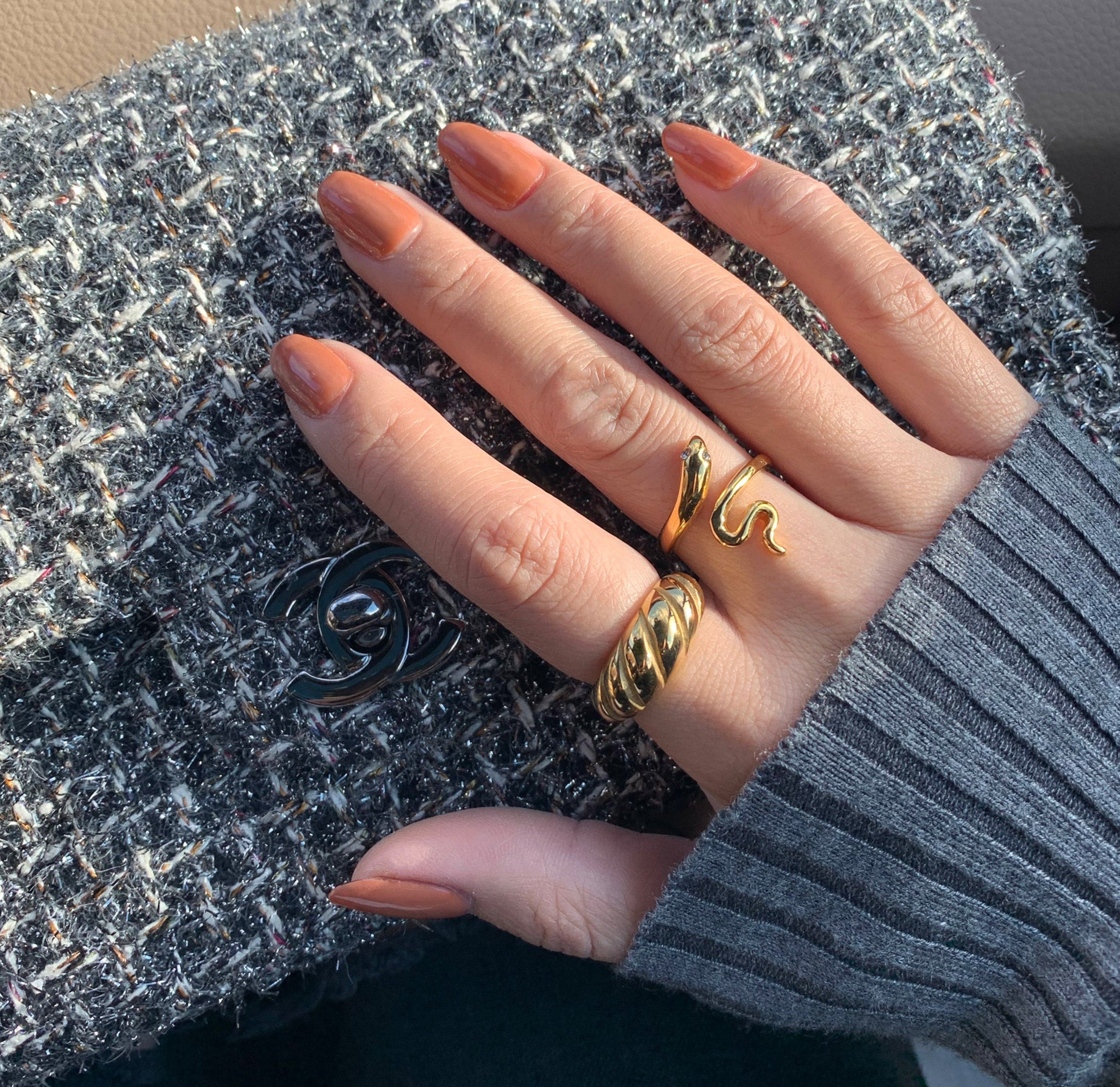 gold snake ring paired with gold croissant ring, waterproof jewelry