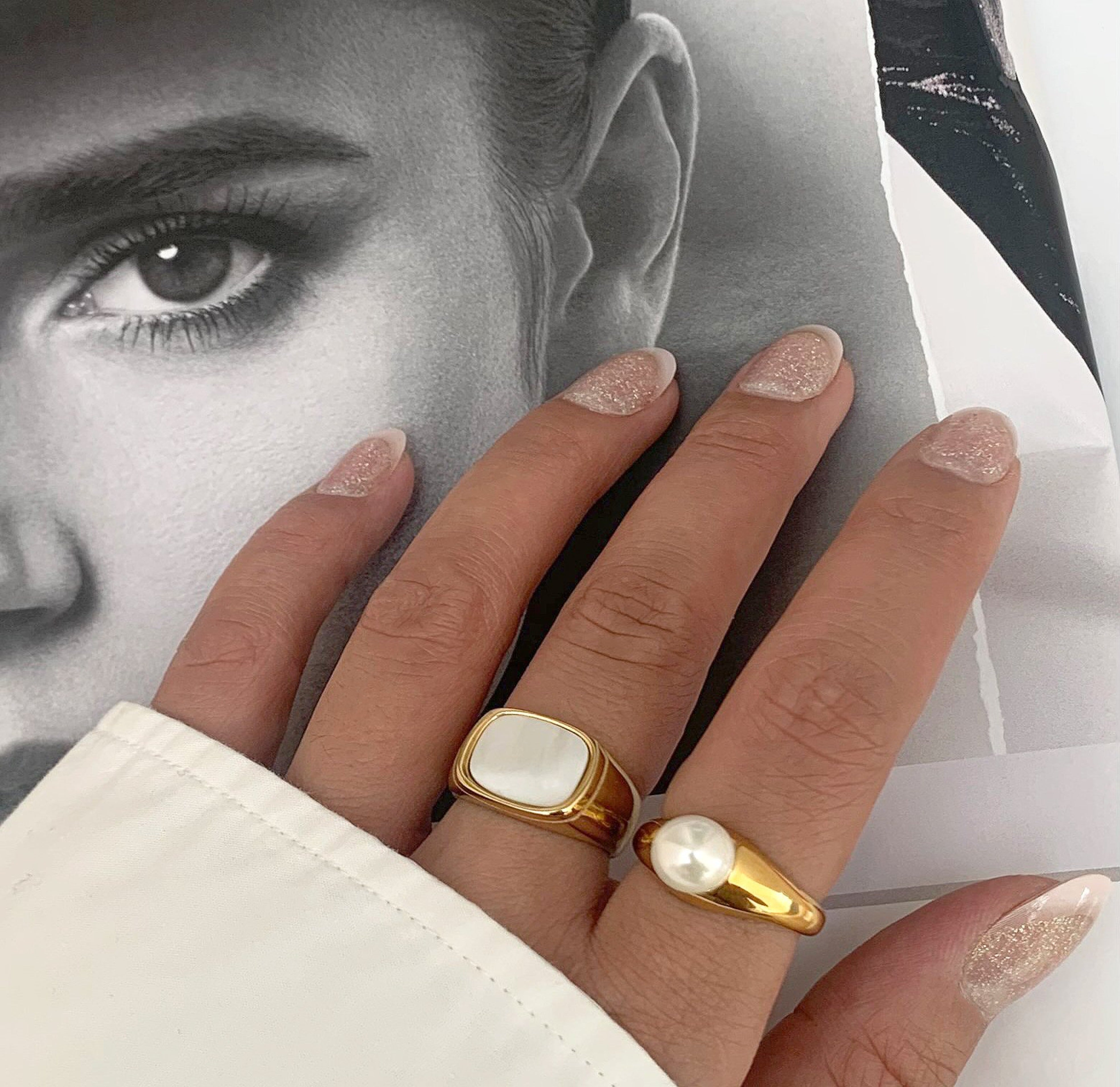 June Gold Pearl Ring paired with Thea Gold Pearl Singnet ring worn on model. Waterproof Jewelry