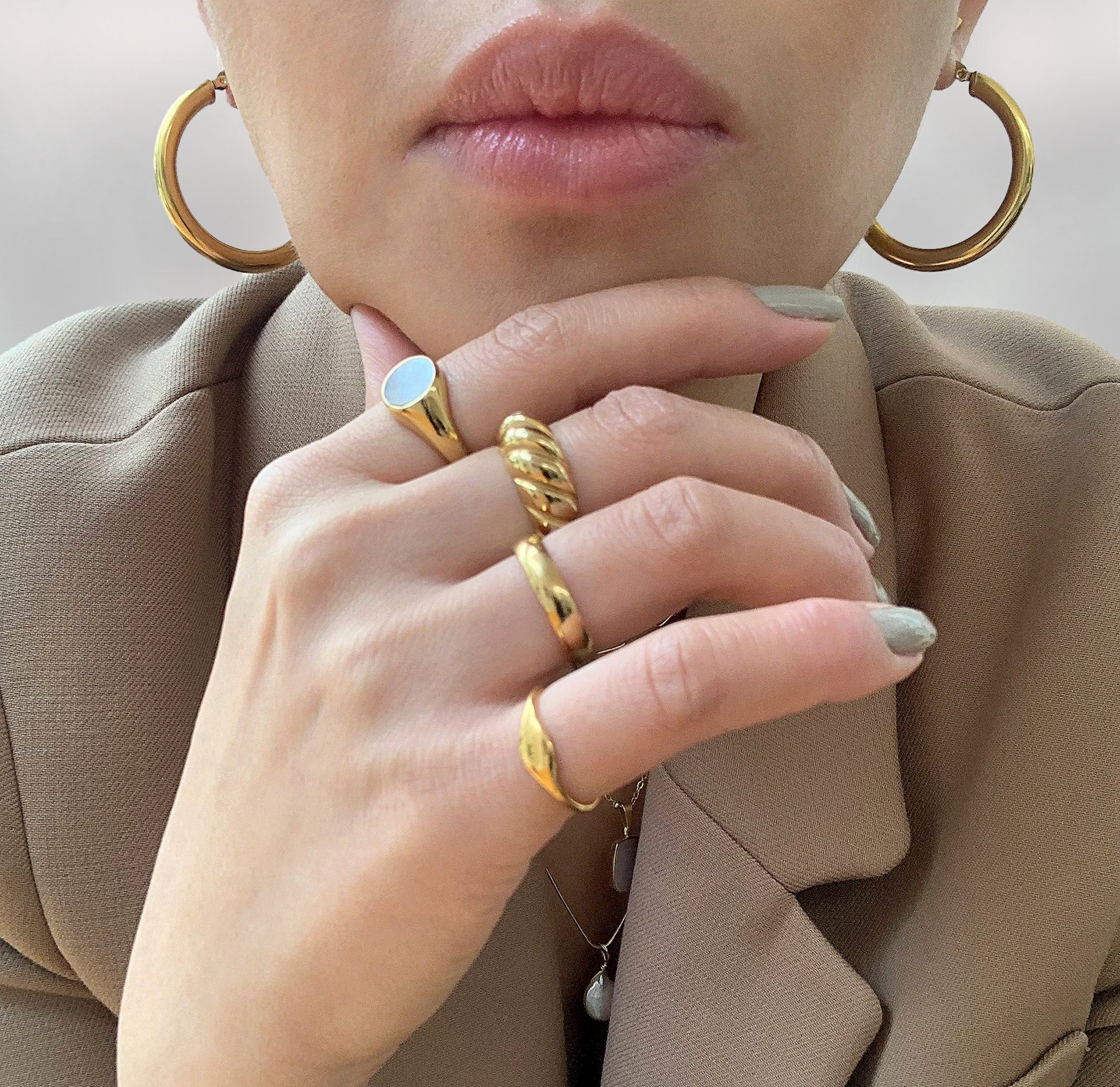 Drew dainty gold signet pink ring paired with Demi pearl sinew ring, Gold Margaux croissant ring, Carson gold ring band, waterproof rings