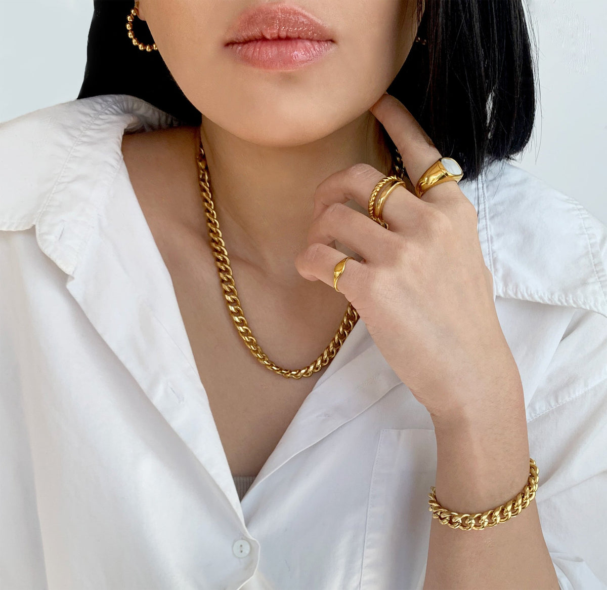 gold duo ring tarnish free pairs with waterproof chain necklace, mason thin hair bracelet, and gold Rocco bead earrings