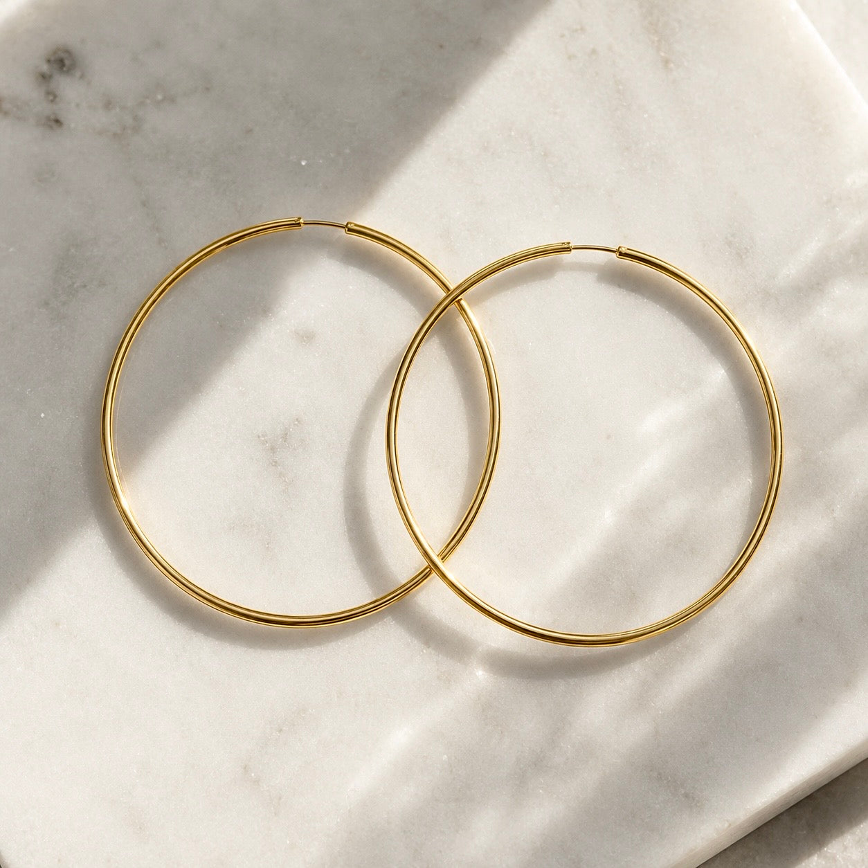 JENNY BIG THIN GOLD HOOP EARRINGS