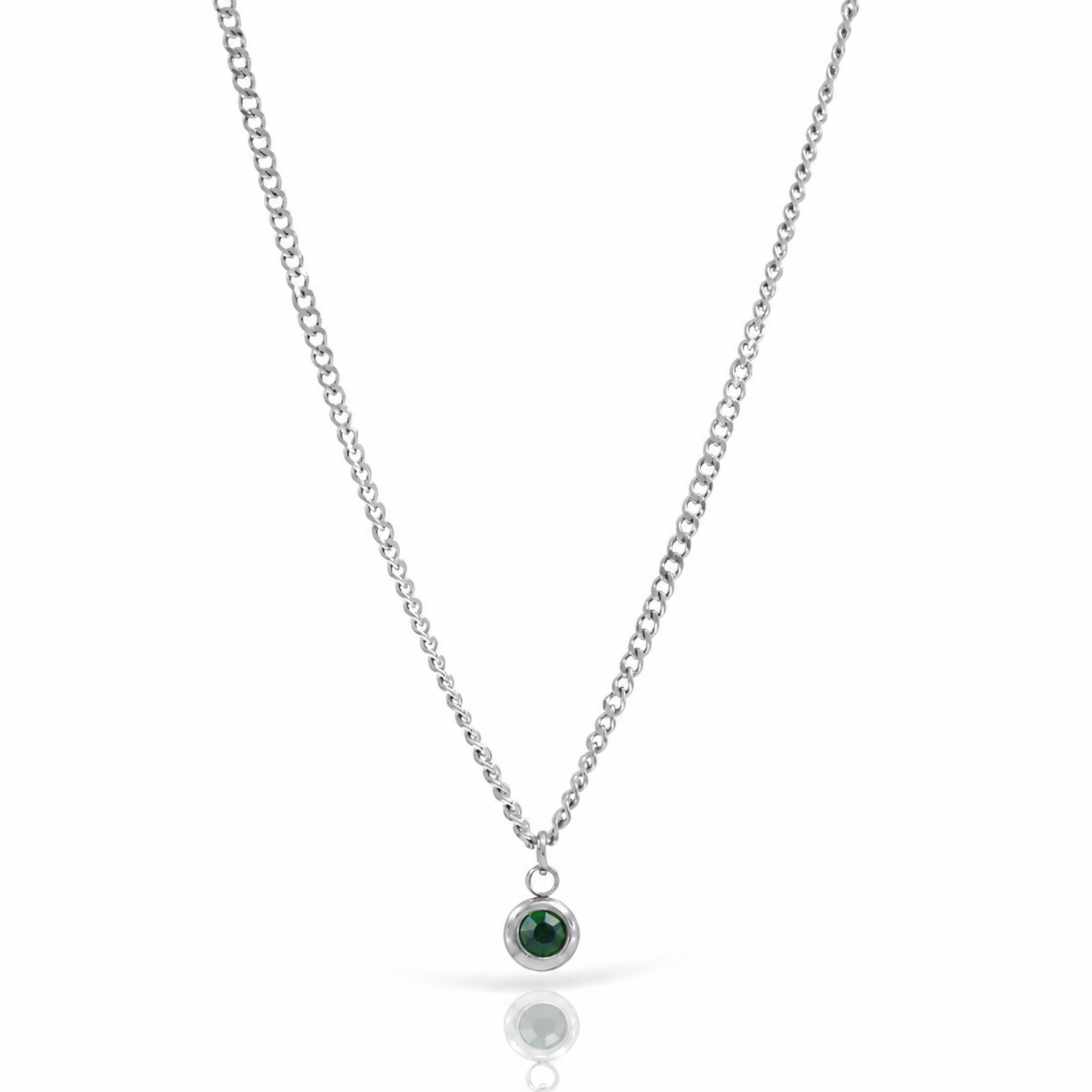 A silver chain necklace with a small round bezel-set dark green gemstone pendant, displayed on a clean white background with a soft reflection below. Silver May birthstone necklace.