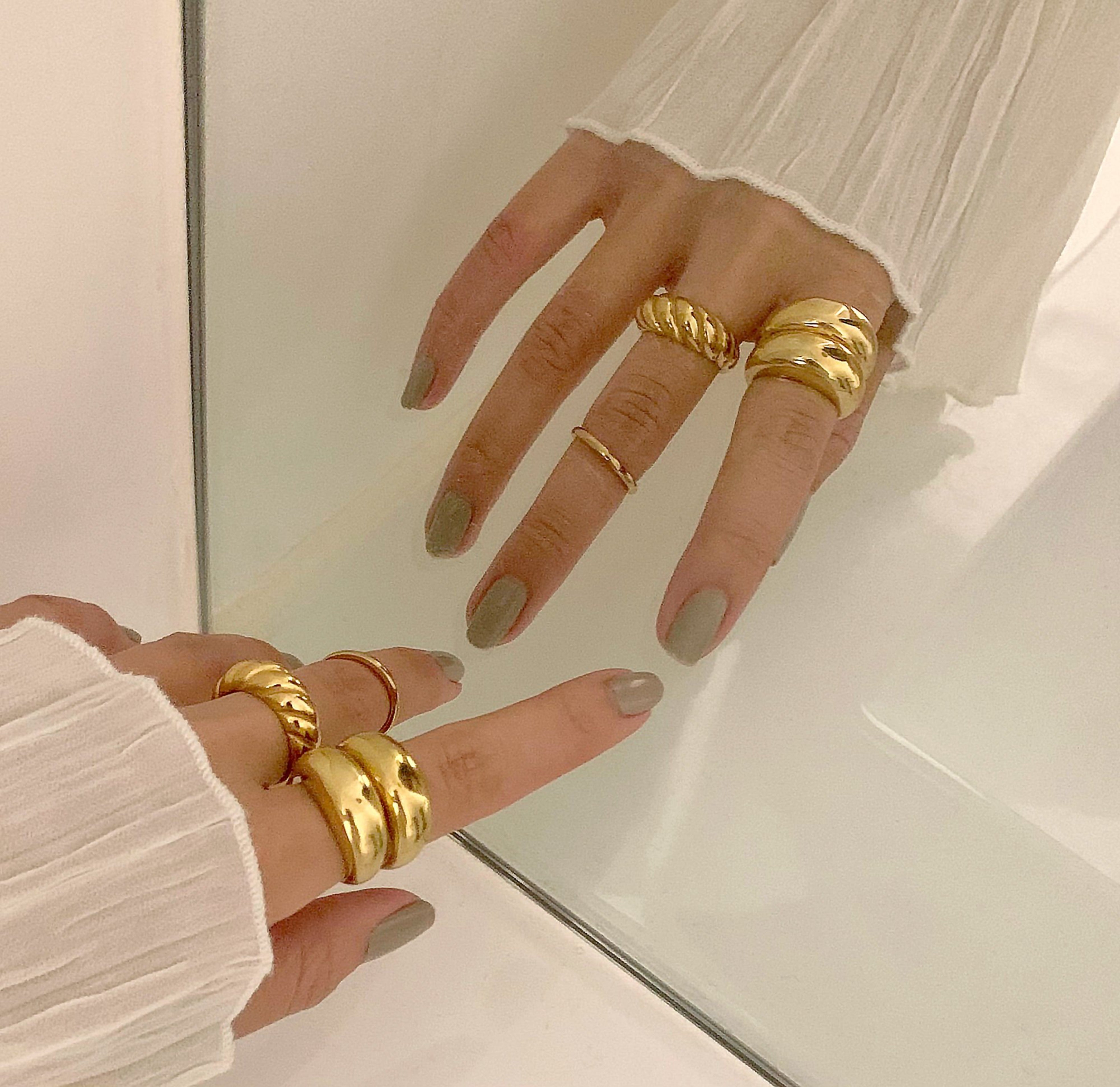 Didi thin gold ring band paired with Capri gold Dome ring and Margaux gold croissant ring, waterproof rings