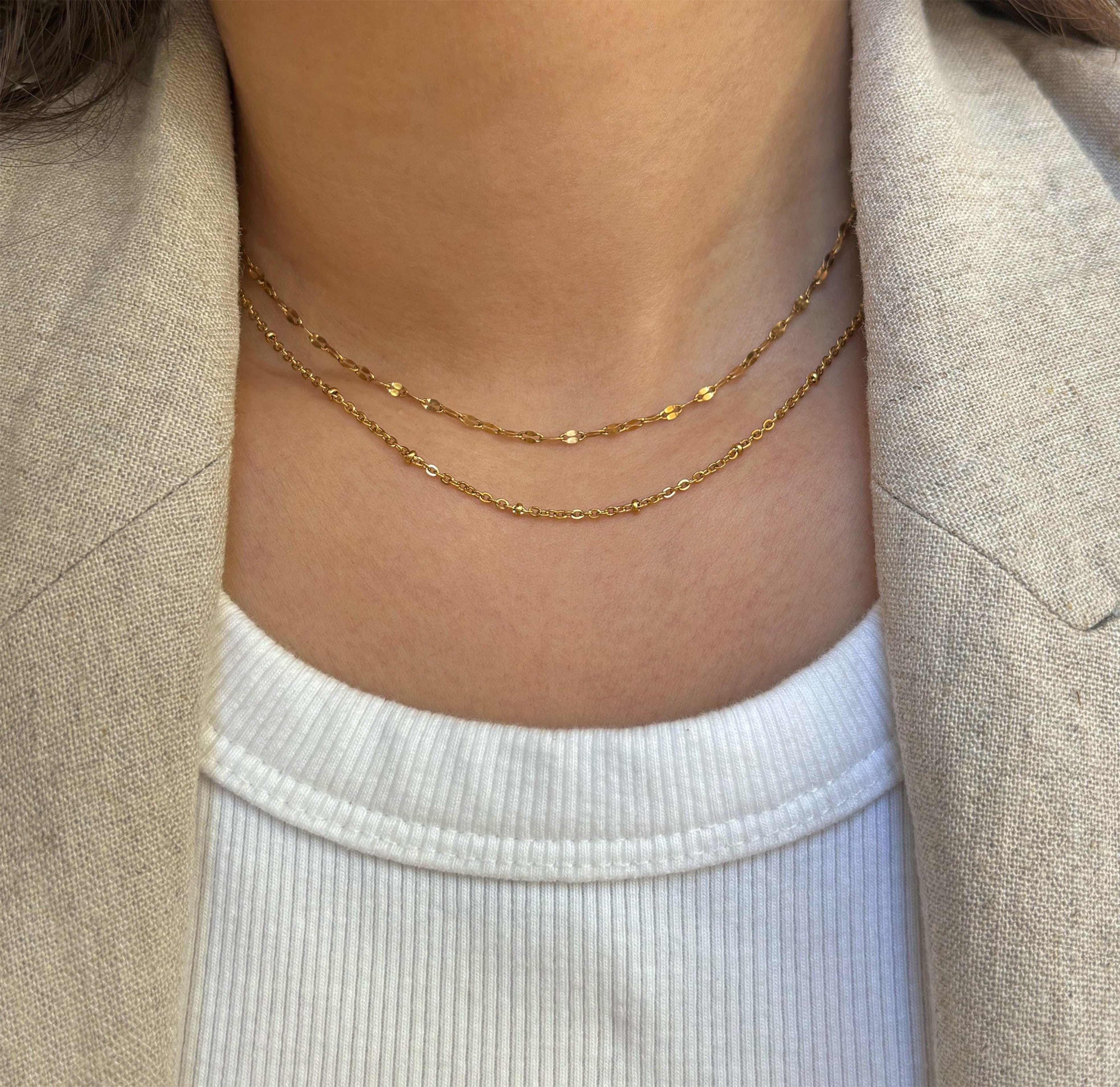 dainty gold satilite necklace stack