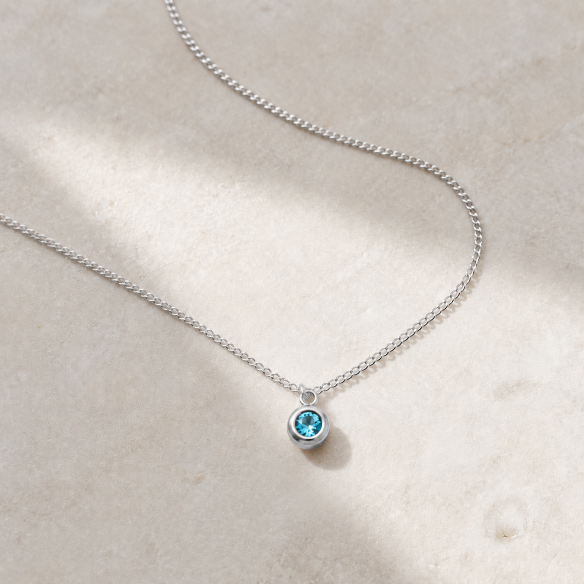 Delilah Silver Blue Topaz Birthstone Pendant Necklace - December