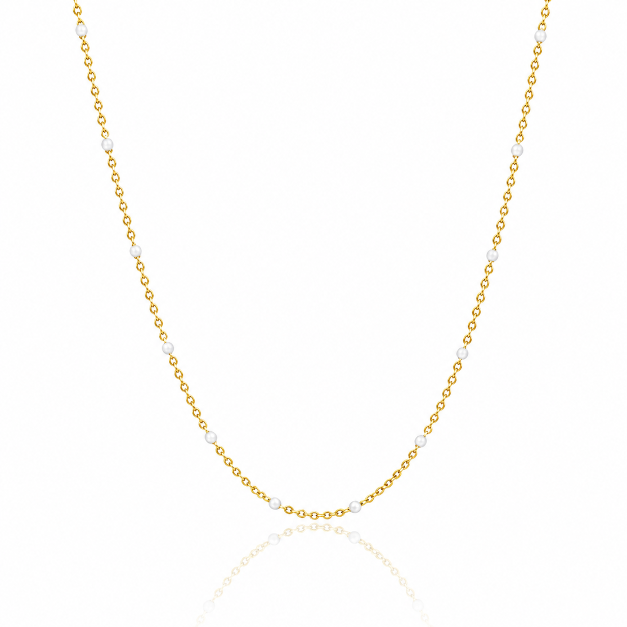 Dainty whited beaded chain necklace on a white background