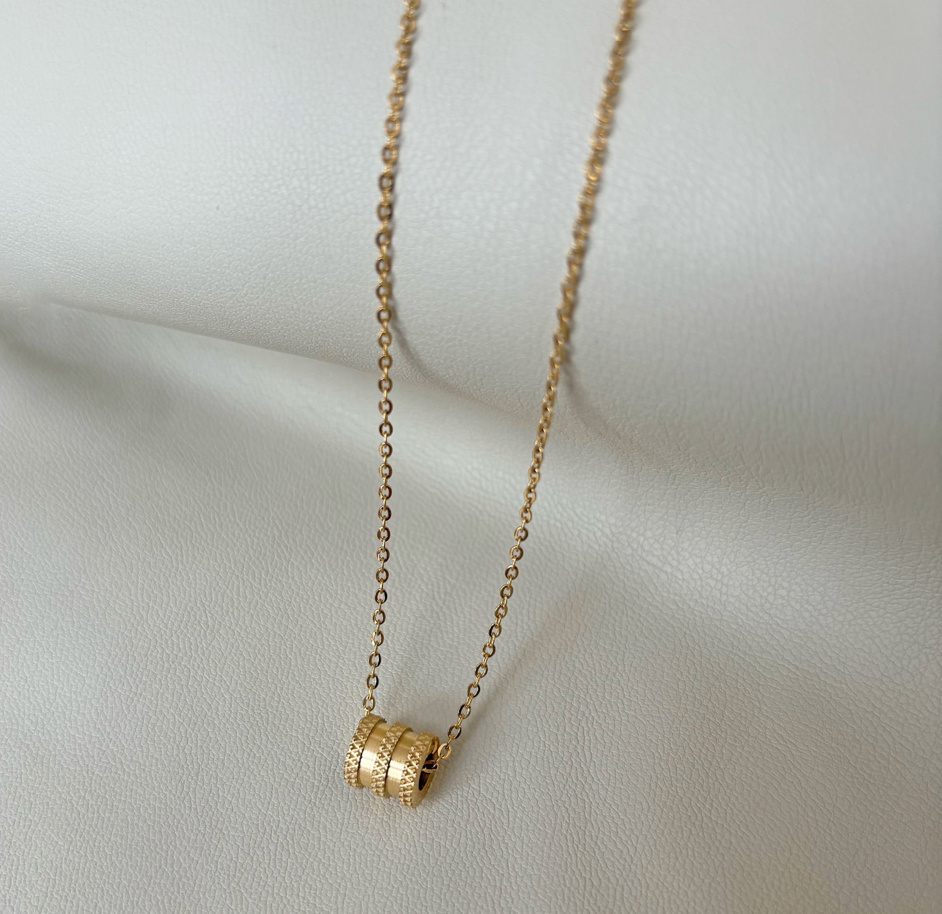 gold barrel necklace