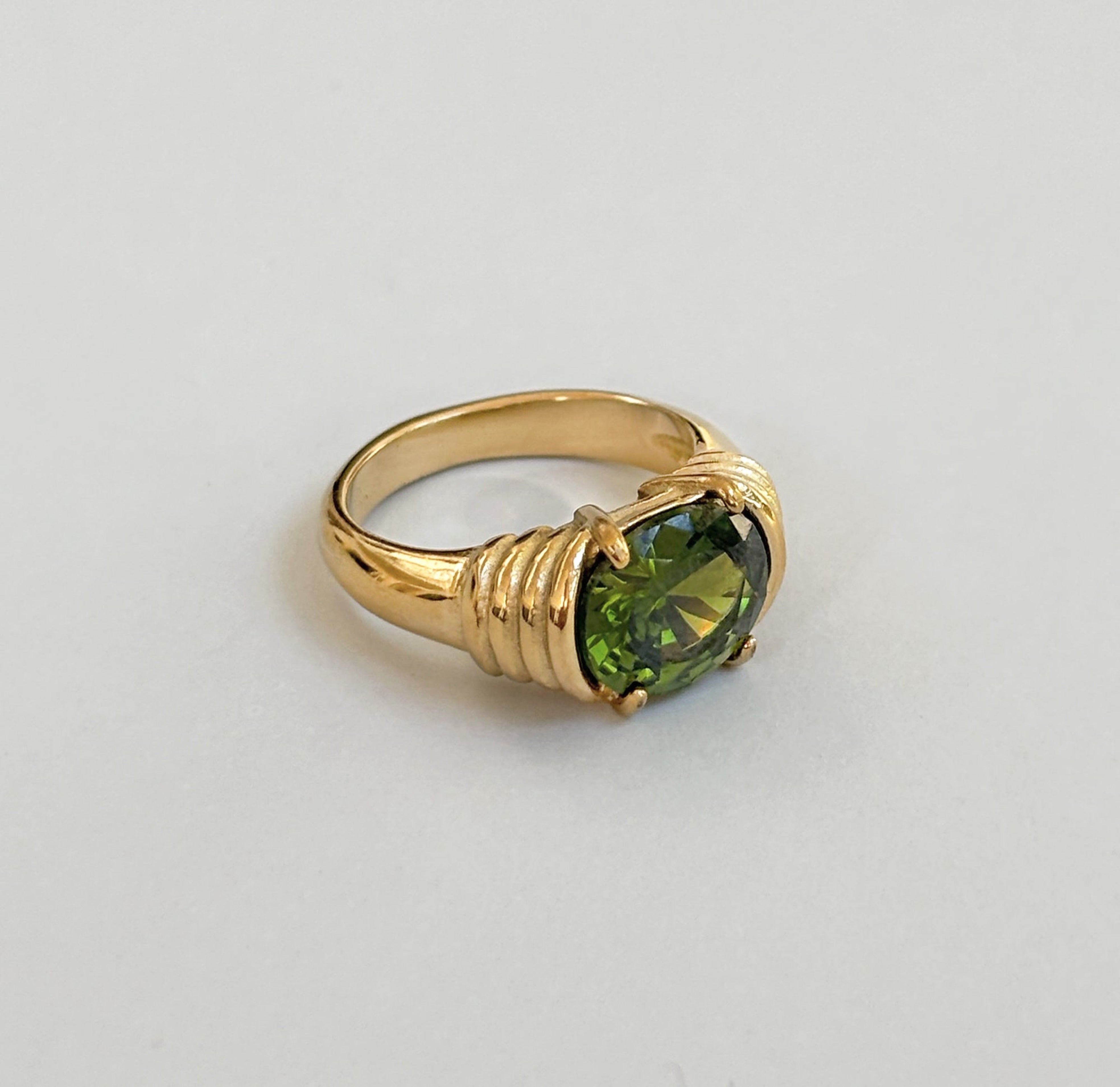 green gemstone heirloom ring side view