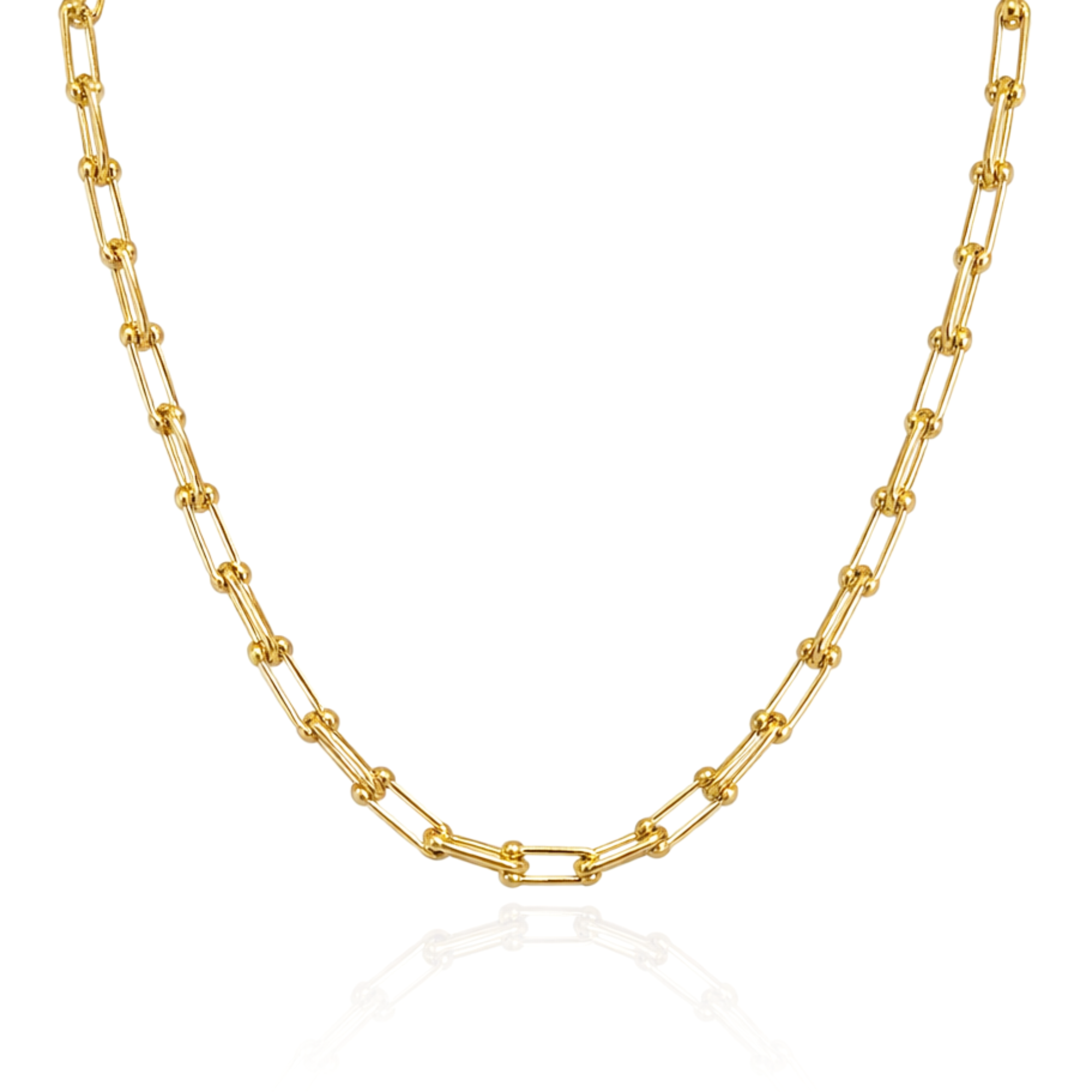 Gold chain necklace on a white background