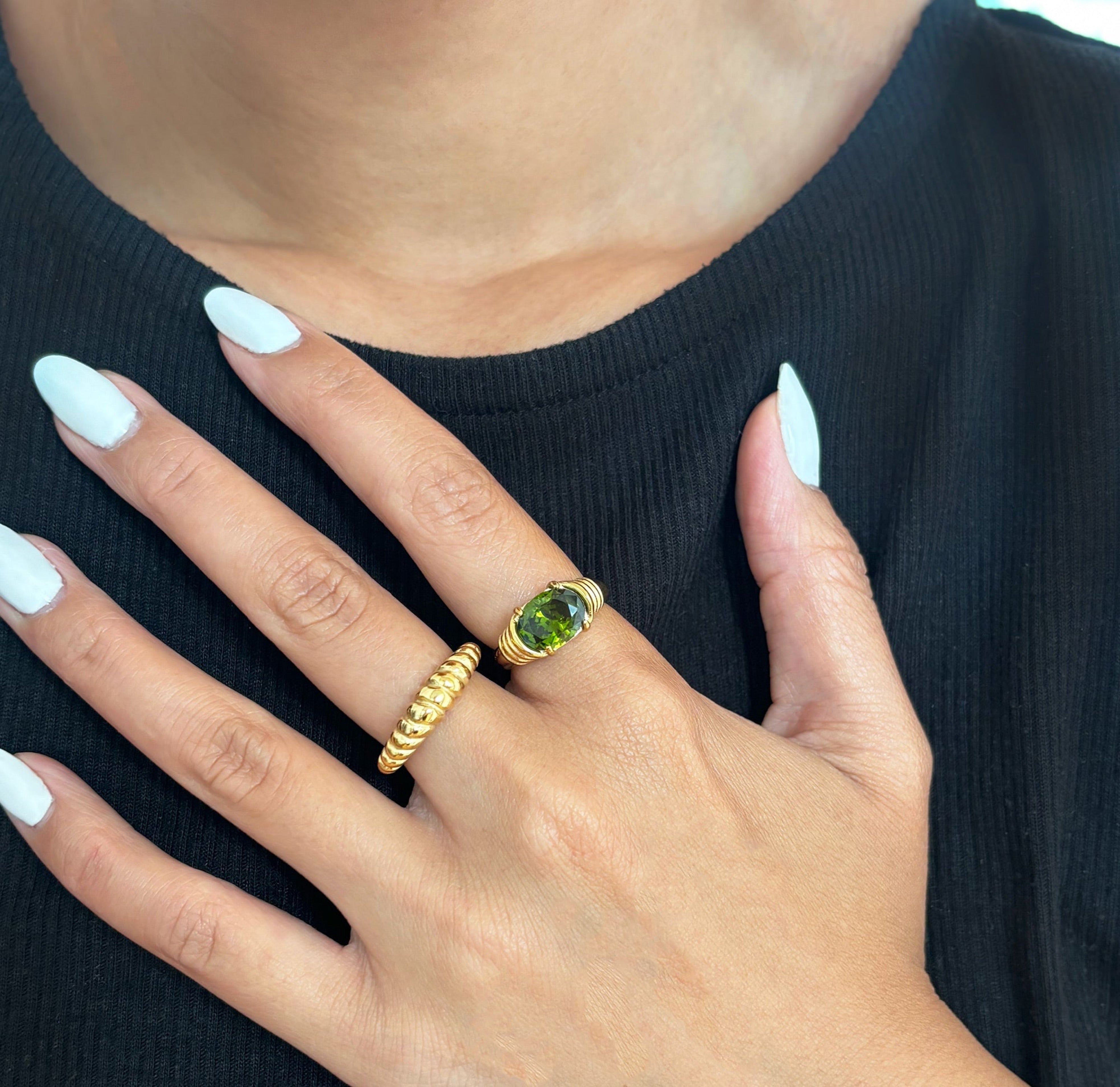 green gemstone heirloom ring stack worn on model