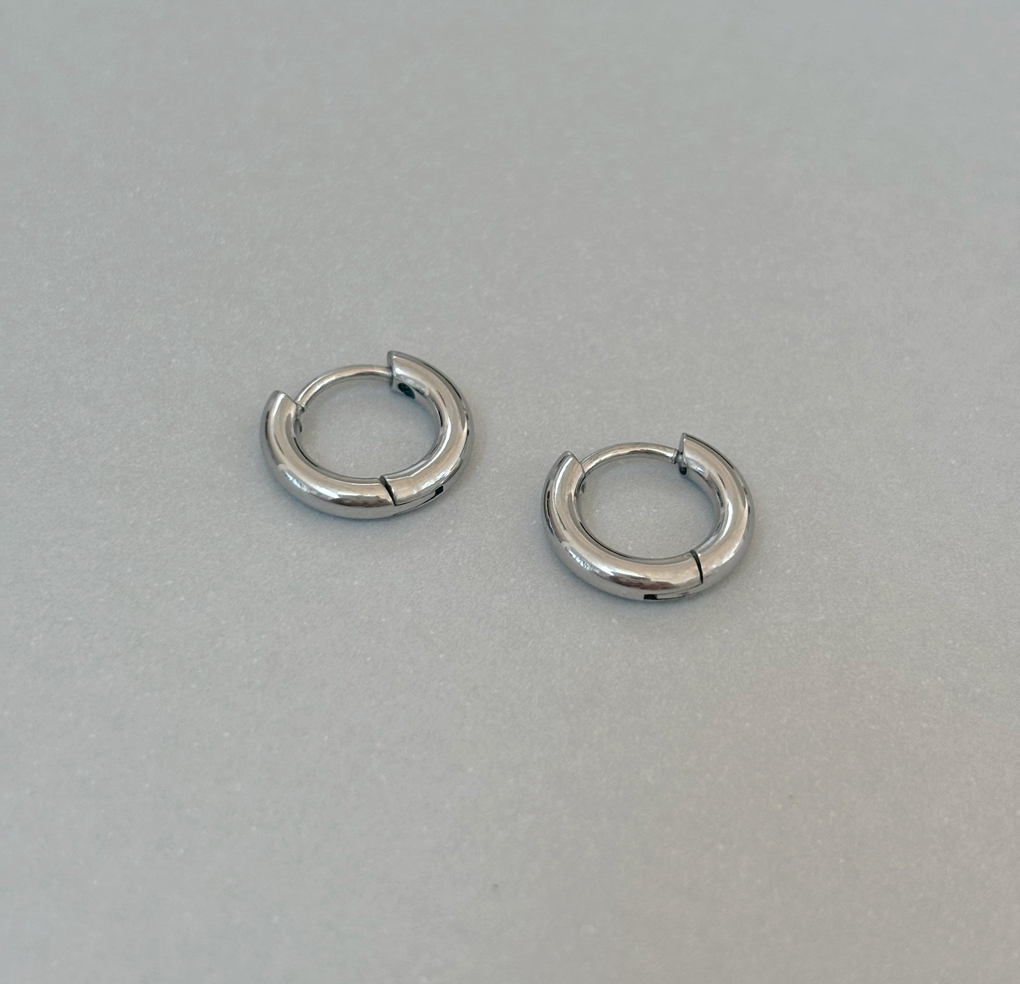 SMALL SILVER HUGGIE HOOP EARRINGS - SAMPLE