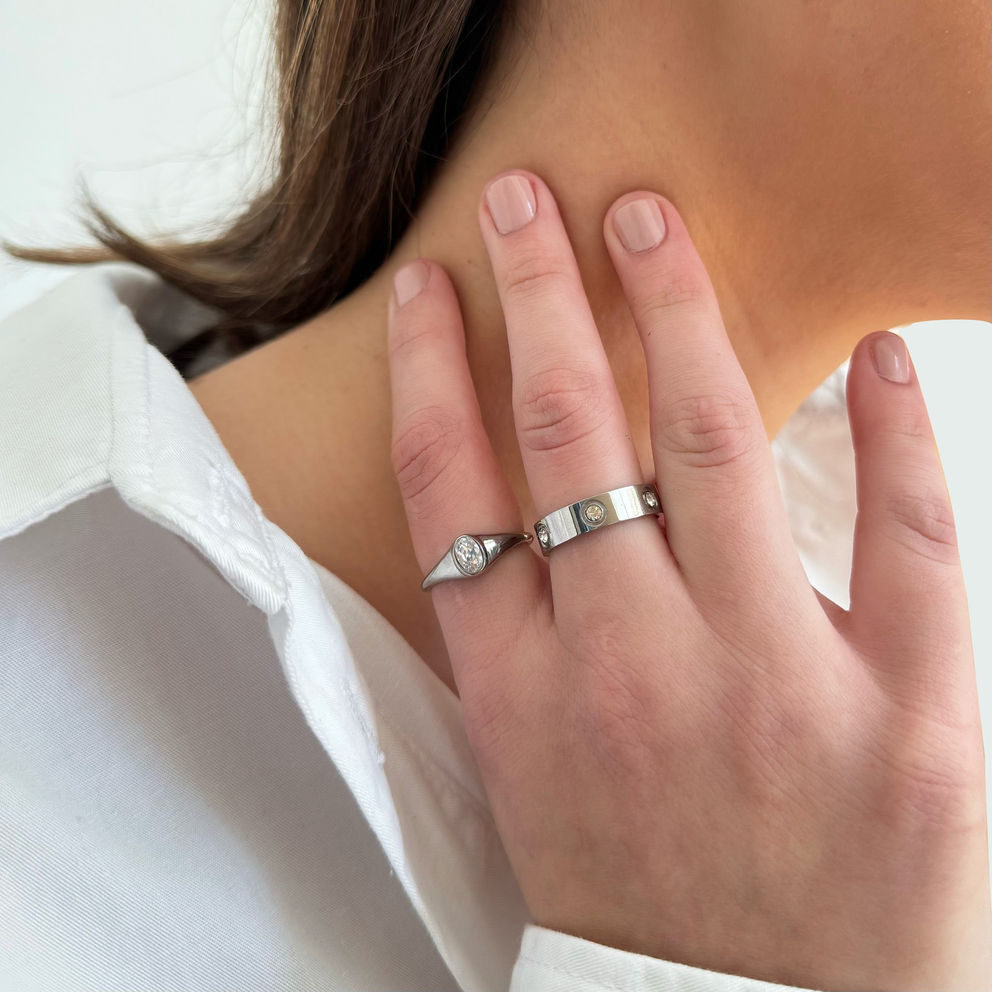 silver oval stone ring stack worn on model tarnish free jewelry