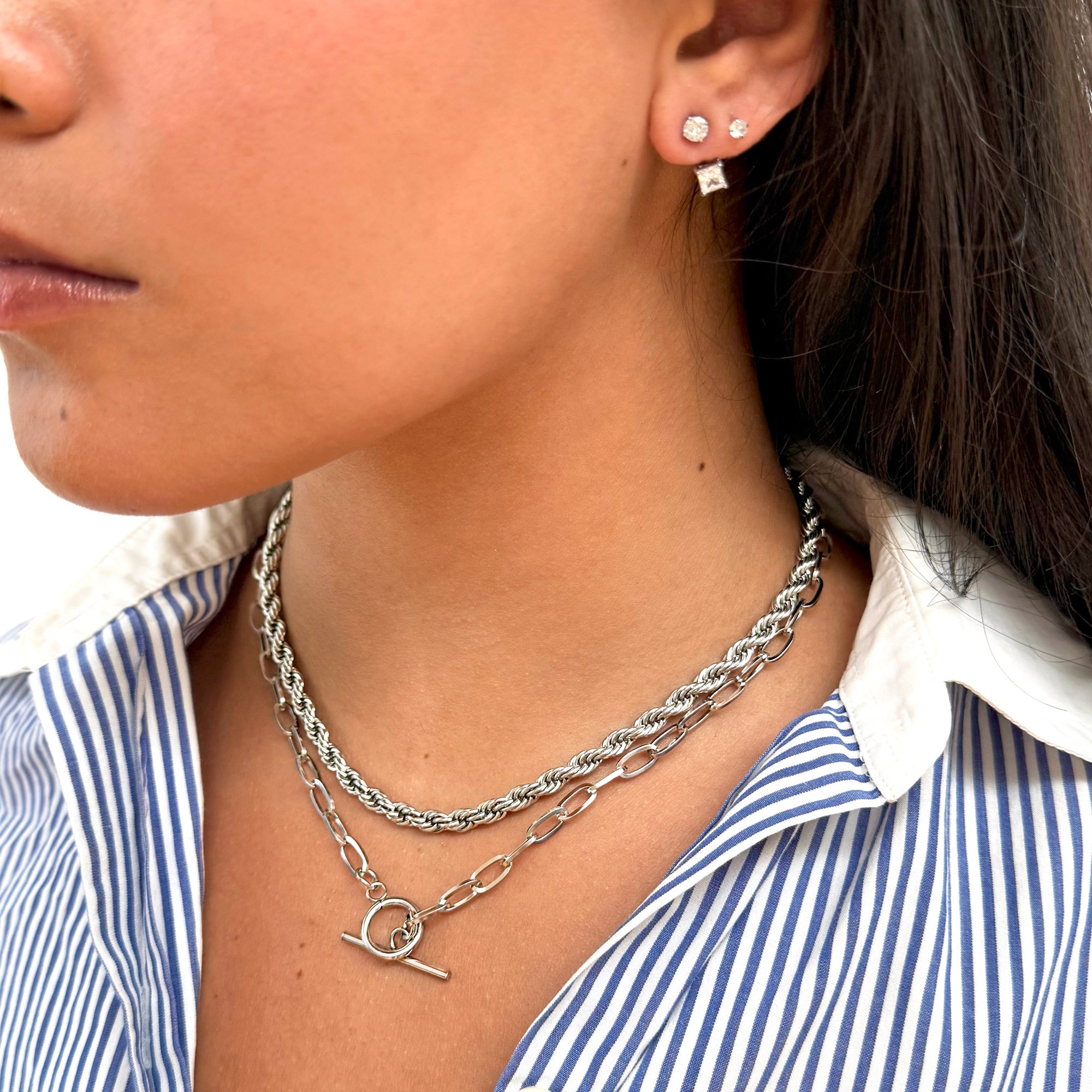model wearing silver-toggle-chain-necklace stacked with classic silver rope chain waterproof jewelry