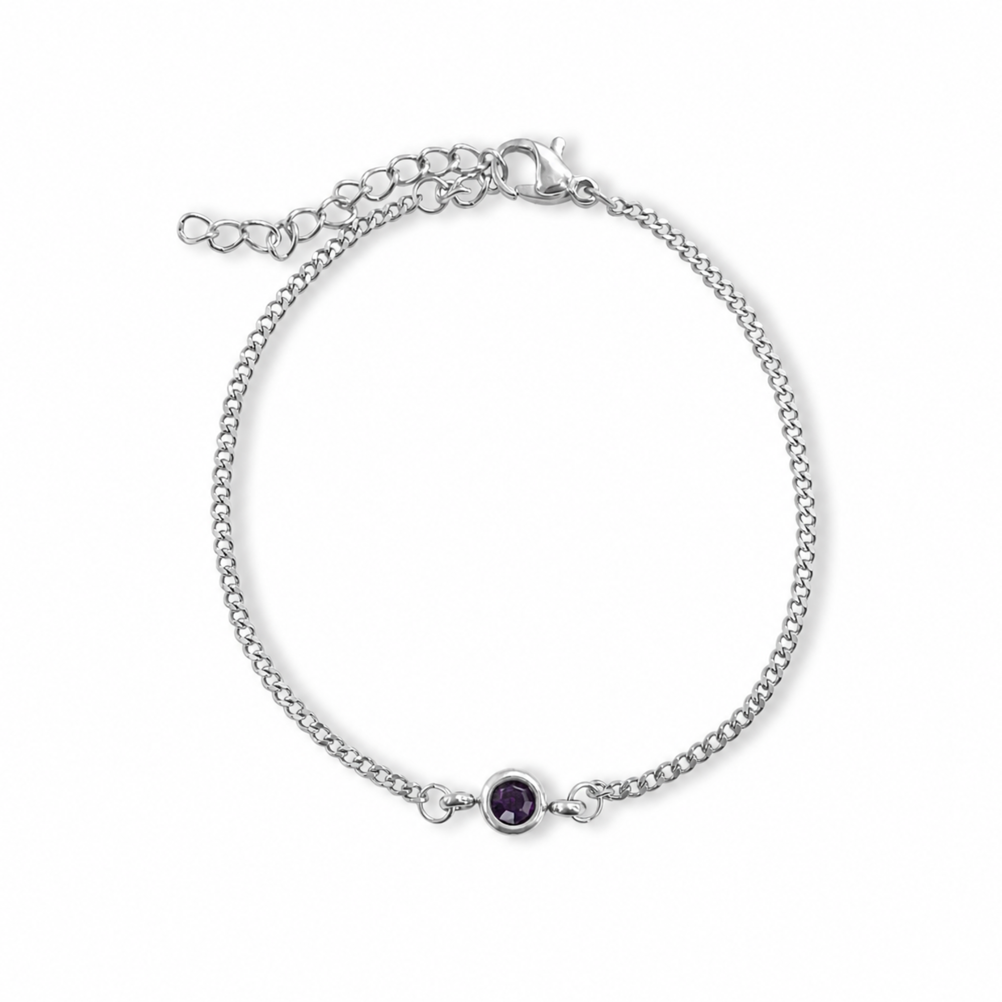 A delicate silver chain bracelet with a single bezel-set round purple gemstone, shown on a plain white background.