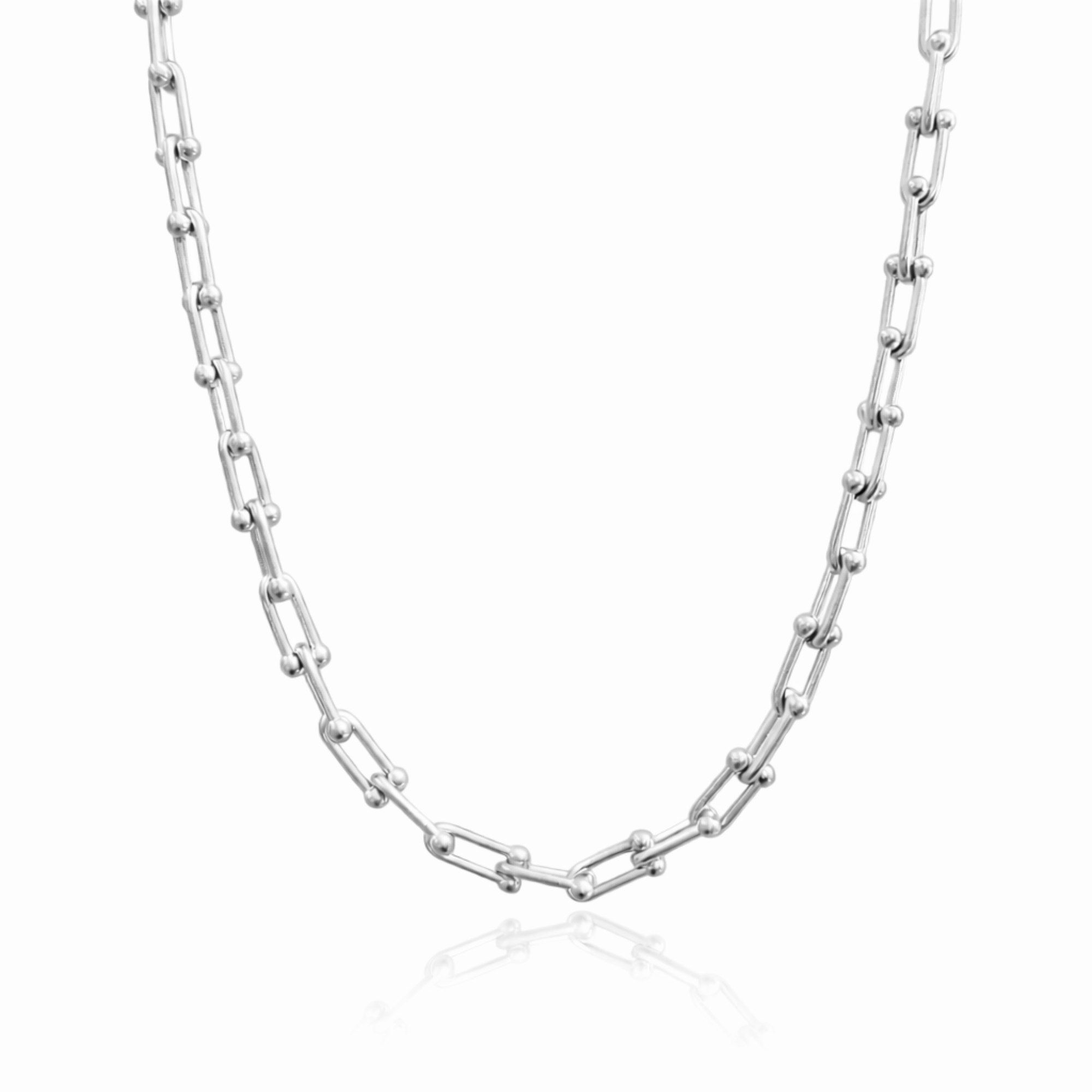 Silver chain necklace on a white background