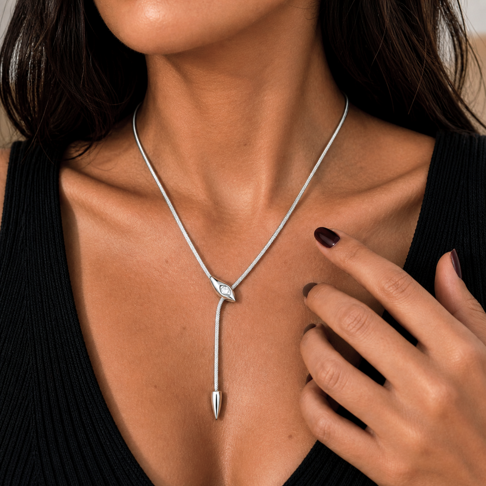 silver serpentine necklace worn on model waterproof jewelry