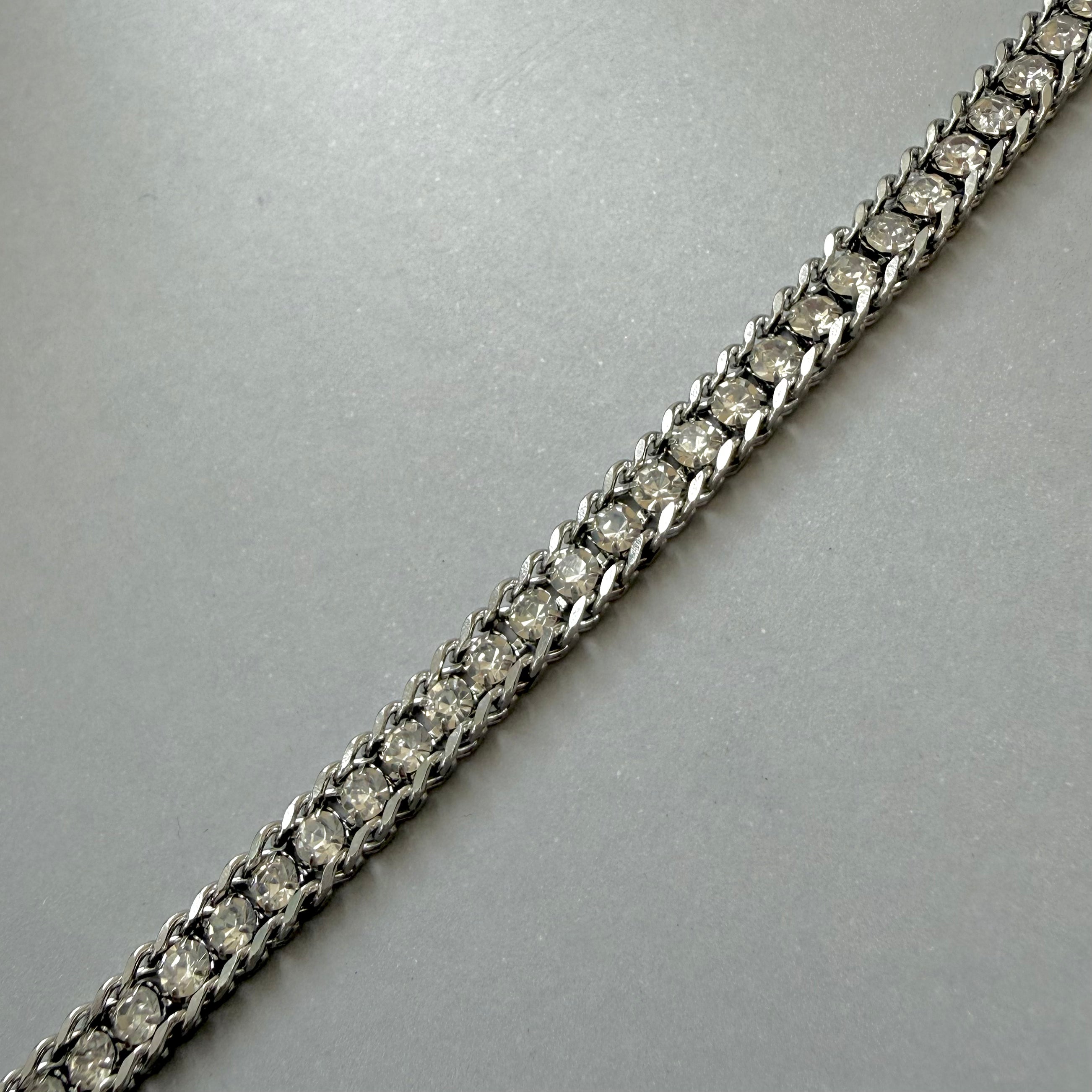 Diamond bracelet on a gray background