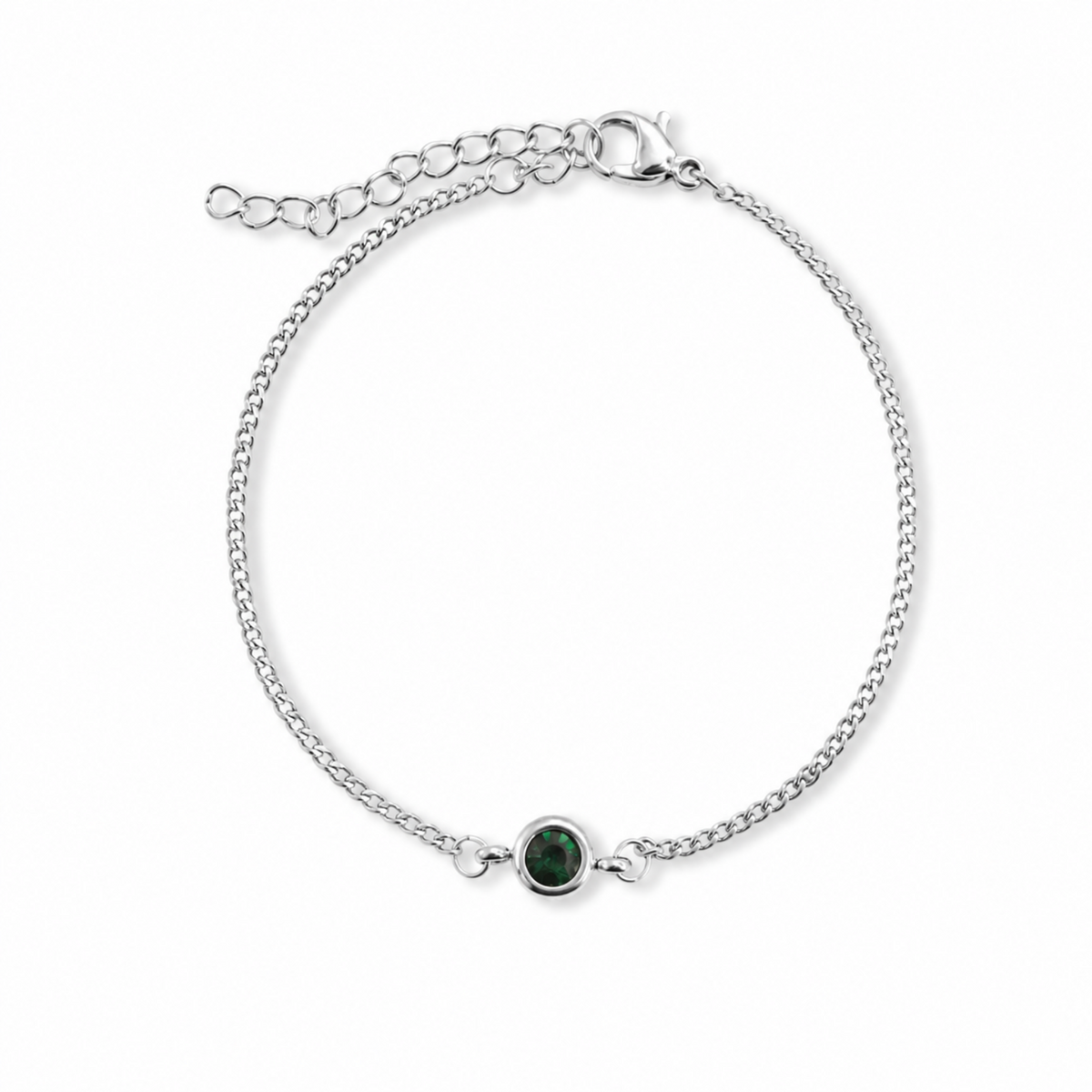 A delicate silver chain bracelet with a small round bezel-set dark green gemstone at the center, shown on a plain white background.