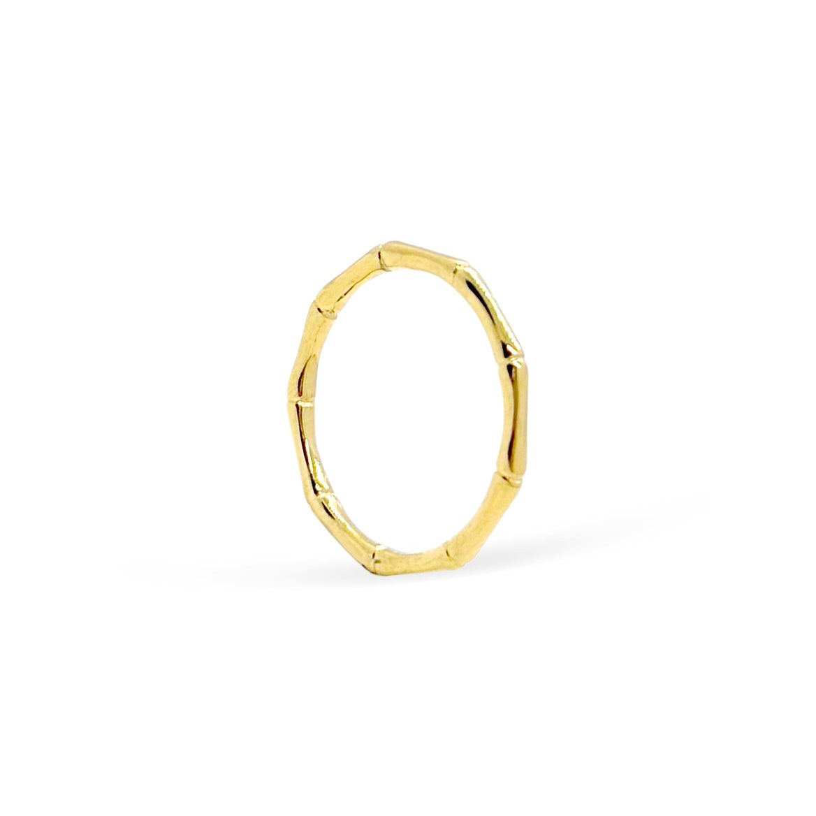 Gold ring with a  bamboo textured design on a white background waterproof jewelry